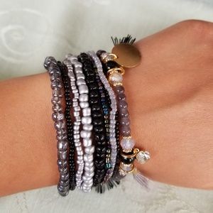 Beautiful stack beaded bracelets with tassels